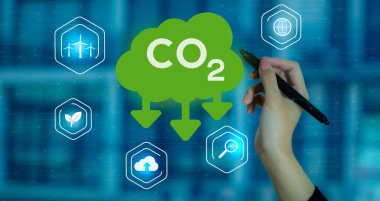 Sustainable development and innovation green business concept. businesswoman hand working with touch screen to reduce CO2 emissions carbon footprint climate change to limit global warming.