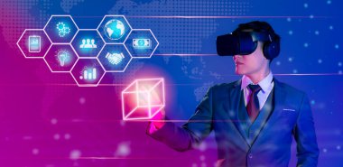Metaverse technology. Businessman wearing vr headset finger touching vitutal digital icon purple and blue golbal background.