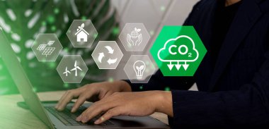 Business value chain and sustainability. Positive environmental impact to value chain product. Carbon footprint reduction. Businessman working on laptop with eco icons.	