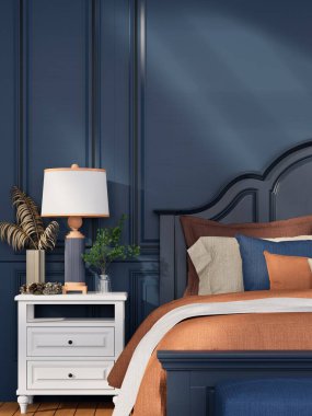 Modaya uygun bir yatak odası, lacivert bir duvar renkli yastıklı rahat bir yatak, beyaz bir komodin ve modern ve davetkar bir atmosfer yaratan bir lamba..