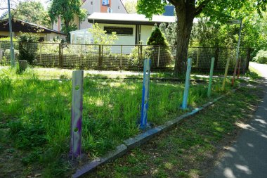 Multi-colored roadblocks symbolizing LGBT+ communities. Berlin, Germany 