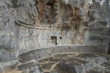 The well-known relief of a Rhodian trireme, warship, cut into the rock at the foot of the steps leading to the acropolis. The relief dates from about 180 BC. Lindos, Rhodes Island, Dodecanese, Greece clipart