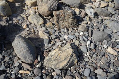 Matas Körfezi 'ndeki Atlantik Okyanusu kıyısındaki Playas de Matas Blancas plajında güzel taşlar bulunur. Costa Calma, Fuerteventura, Las Palmas, Kanarya Adaları, İspanya. 