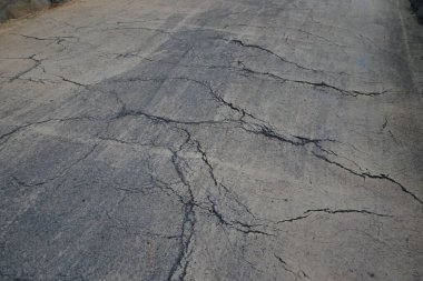 Atlantik Okyanusu kıyısı boyunca uzanan asfalt bir yol. Costa Calma, Fuerteventura, Las Palmas, Kanarya Adaları, İspanya. 