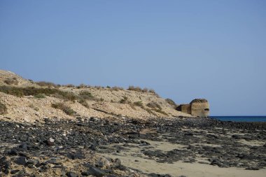 One of the bunkers from World War II in Costa Calma, built by the then Spanish general and dictator Francisco Franco out of fear of an Allied invasion. Playa el Granillo, Fuerteventura, Las Palmas, Canary Islands, Spain.    clipart