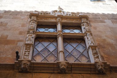 16. yüzyıl ikametgahındaki Rönesans tarzı pencereler Can Catlar veya Cal Marques del Palmer Mallorca 'nın eski Palma, Mallorca, İspanya' daki eski aristokrat mahallesinin kalbinde yer almaktadır.. 