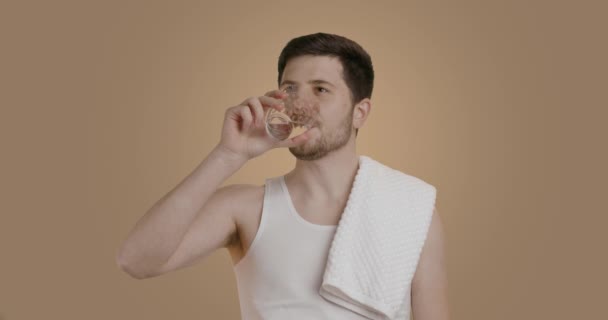Young Man Drinking Morning Water Transparent Glass Young Brunette Man — Stock video
