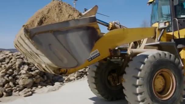Construction Site Huge Yellow Excavator Loads Sand Moves Another Place — Stock Video