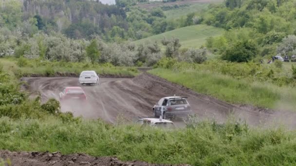 Several Racing Cars Start Starting Line Bumpy Track Lot Dust — Stock Video