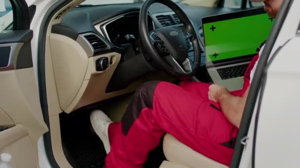 Mechanic Conducts Diagnostics Car Malfunction Laptop Green Chroma Key Screen Video Clip