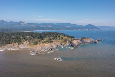 Port Orford Heads at the Southern Oregon Coastline. Drone view.  clipart