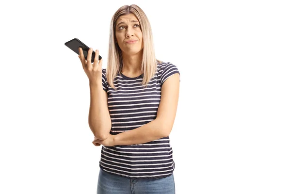 Uttråkad Ung Kvinna Lyssnar Telefonsamtal Högtalartelefon Isolerad Vit Bakgrund — Stockfoto