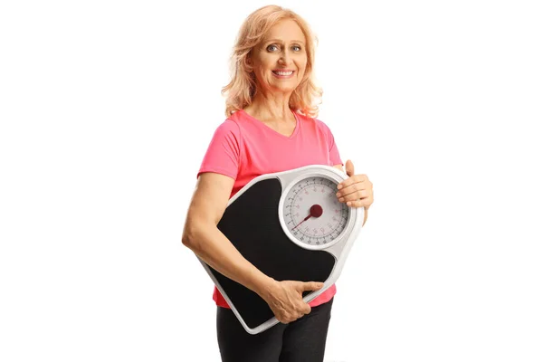 Smiling Mature Woman Sportswear Holding Measuring Scale Isolated White Background — Stock Photo, Image