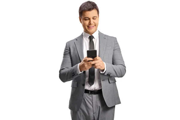 Junger Profi Grauen Anzug Mit Smartphone Auf Weißem Hintergrund — Stockfoto