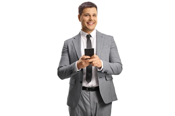 Jeune Homme Professionnel Costume Gris Utilisant Smartphone Souriant Isolé Sur — Photo