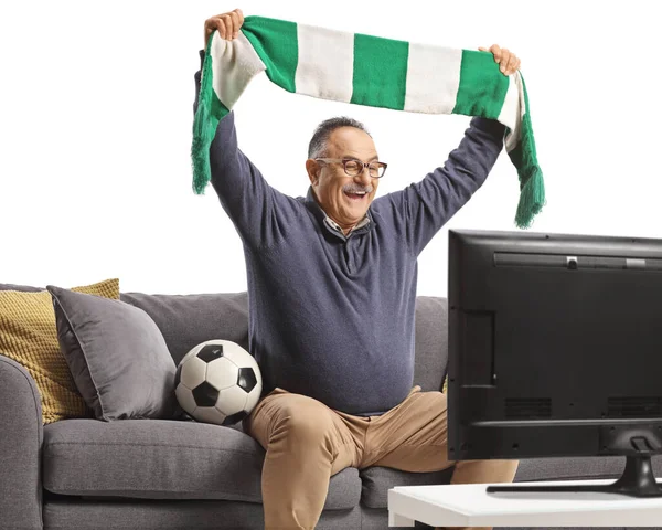 Mature Man Sitting Sofa Watching Football Match Cheering Scarf Isolated — Stock Photo, Image