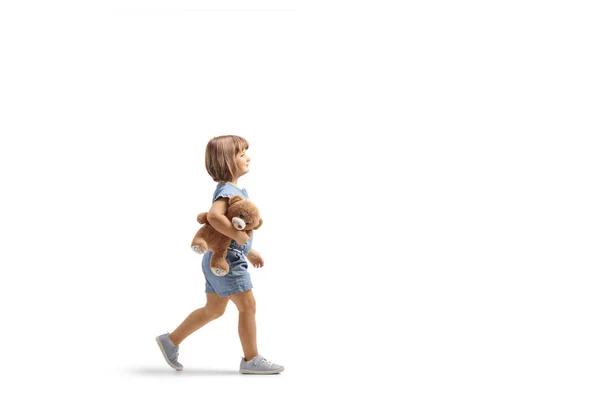 Full Length Profile Shot Little Girl Walking Holding Teddy Bear — Stock Photo, Image