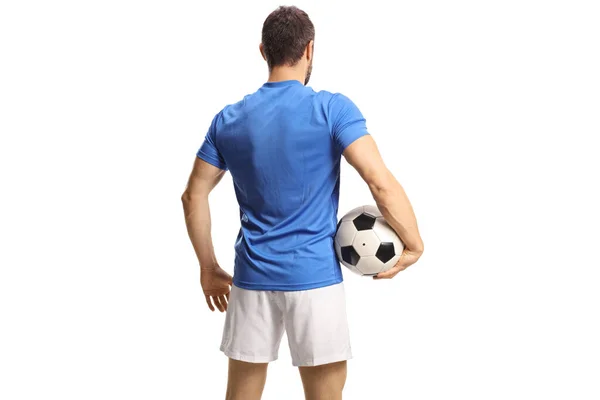 足球运动员拿着一个在白色背景上隔离的球的后视镜镜头 — 图库照片