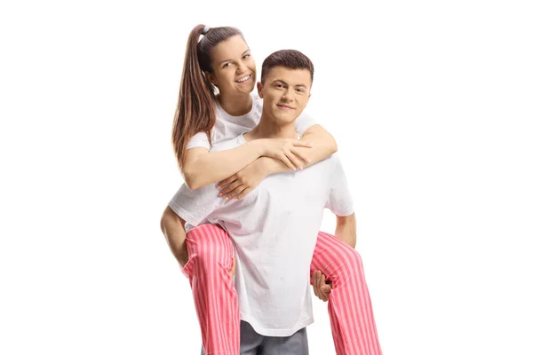 Young Man Pajamas Carrying Girl Piggyback Isolated White Background Royalty Free Stock Photos