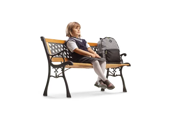 Schoolgirl Backpack Sitting Bench Looking Away Isolated White Background — Stock Photo, Image