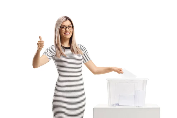 stock image Female citizen voting at election and showing thumbs up isolated on white background