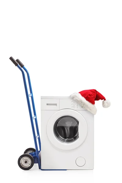 Chapéu Papai Noel Uma Máquina Lavar Roupa Isolada Fundo Branco — Fotografia de Stock