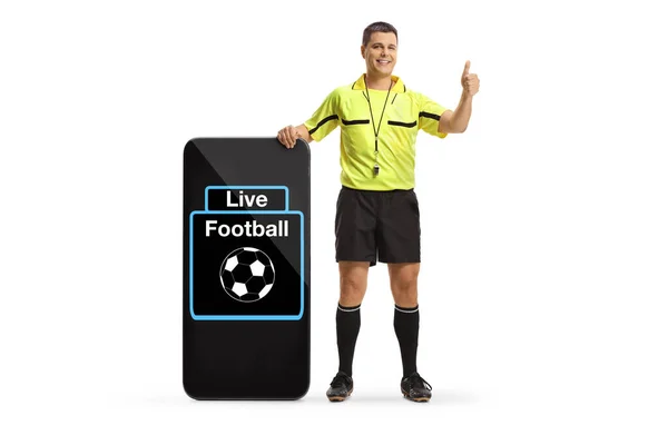 Full Length Portrait Referee Gesturing Thumbs Next Big Smartphone Text — Stock Photo, Image