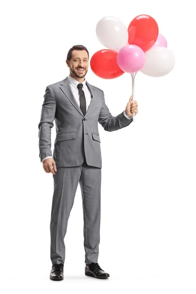 Geschäftsmann Hält Luftballons Isoliert Auf Weißem Hintergrund — Stockfoto