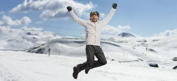 Happy Man Winter Coat Skiing Helmet Jumping Mountain — Stock Photo, Image