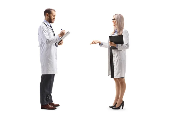 Full Length Profile Shot Male Female Doctor Standing Discussing Isolated — Stock Photo, Image