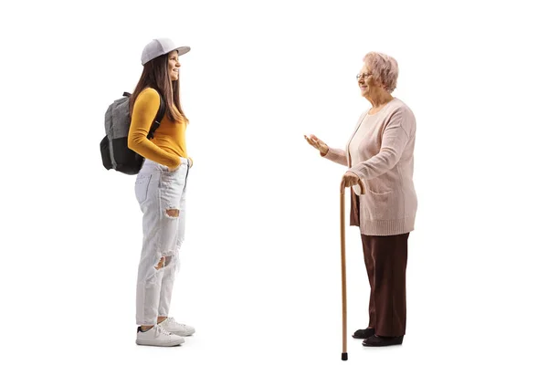 Junge Frau Hört Großmutter Isoliert Auf Weißem Hintergrund Reden — Stockfoto