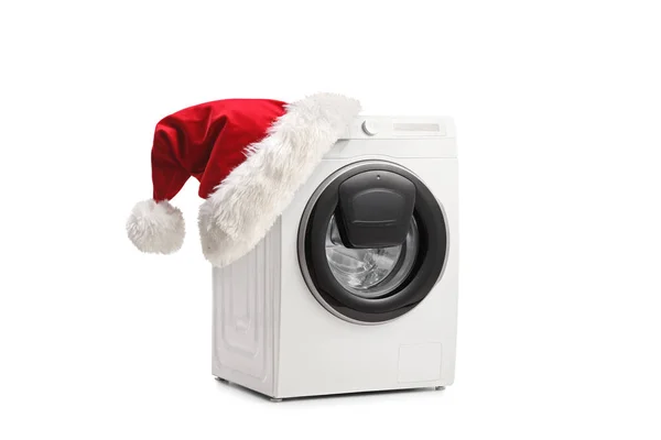 Ansicht Einer Waschmaschine Mit Weihnachtsmann Hut Isoliert Auf Weißem Hintergrund — Stockfoto