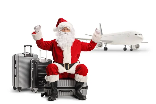 Kerstman Zit Een Koffer Een Vliegveld Gebaart Geluk Geïsoleerd Witte — Stockfoto