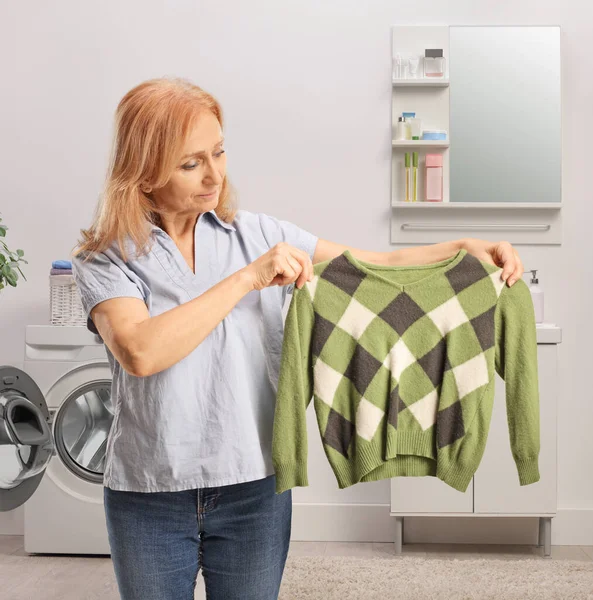 Woman Holding Sweater Bathroom — Stock Photo, Image