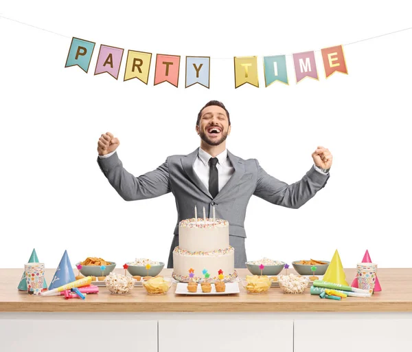 Young Man Suit Standing Counter Cake Flags Text Party Time — Foto Stock