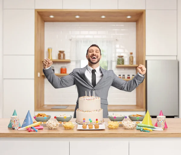 Businessman Gesturing Happiness Counter Cake Kitchen — Foto Stock