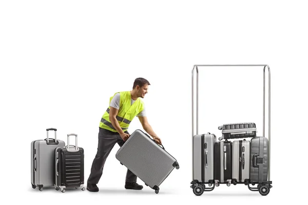 Male Worker Putting Suitcases Luggage Trolley Isolated White Background — Stockfoto