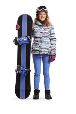 Full length portrait of a female with snowboard standing and looking at camera isolated on white background