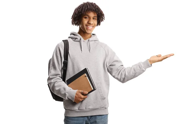 African American Male Student Holding Books Showing Hand Isolated White — Fotografia de Stock