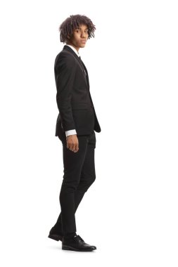 Full length shot of a young african american male model in a suit and tie isolated on white background