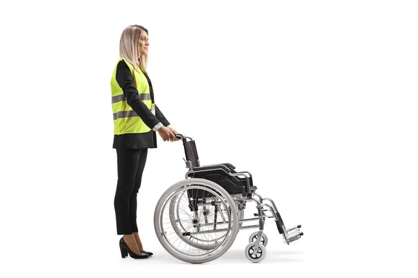 Full Length Profile Shot Female Assitance Worker Standing Wheelchair Isolated — Stock fotografie