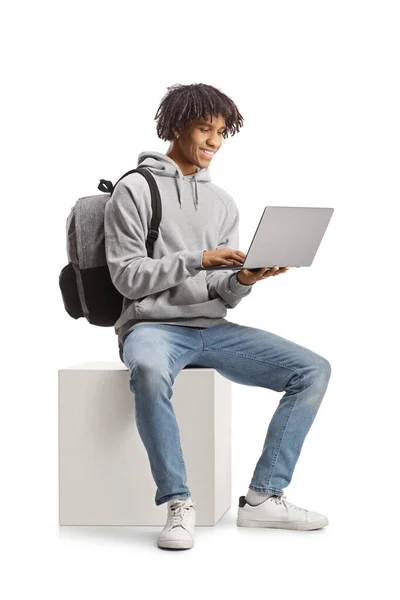 Male African American Student Sitting Using Laptop Computer Isolated White — Photo