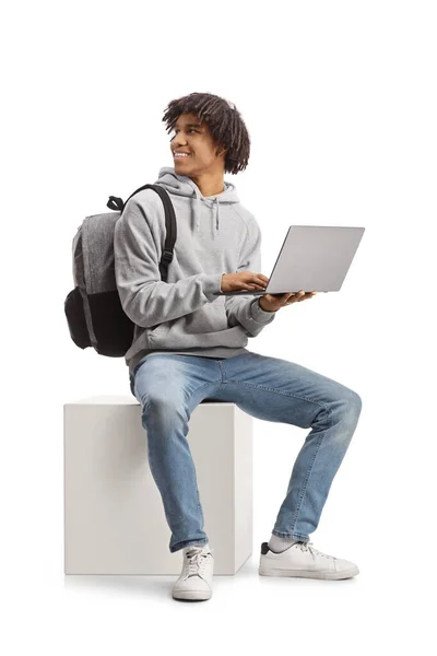 Male African American Student Sitting Laptop Computer Looking Backwards Isolated — Stock fotografie