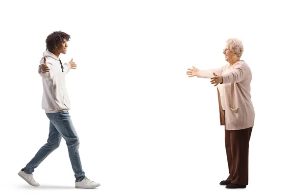 African American Young Man Walking Caucasian Elderly Woman Isolated White — Fotografia de Stock