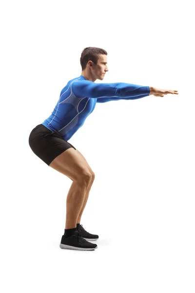 Full Length Profile Shot Male Athlete Exercising Isolated White Background — Stockfoto