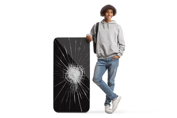 Young African American Man Big Mobile Phone Cracked Screen Isolated — Stock fotografie