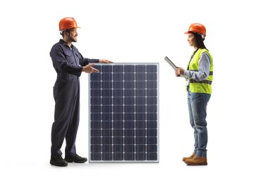 Worker presenting a solar panel to a female engineer isolated on white background