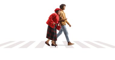 Young african american man helping a caucasian senior woman on a pedestiran crossing isolated on white background