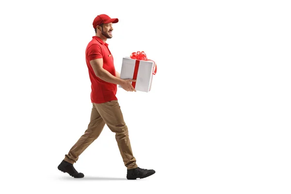 Full Length Profile Shot Delivery Worker Carrying Present Box Isolated — Stockfoto
