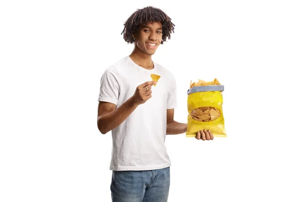 Young African American Man Eating Tortilla Crisps Smiling Isolated White — Stock Photo, Image